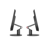 Two computer monitors on stands with a white background